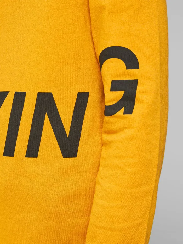 Tshirts JACK and JONES Junior BOYS LOGO LONGSLEEVED TSHIRT Yellow Golden Orange Near Me