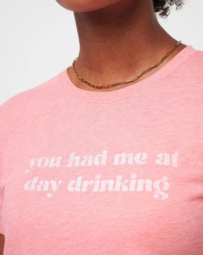 TravisMathew DANCING LIGHT GRAPHIC TEE Heather Shell Pink Women Tees