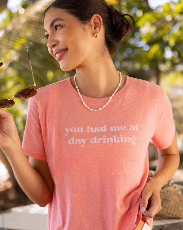 TravisMathew DANCING LIGHT GRAPHIC TEE Heather Shell Pink Women Tees TravisMathew DANCING LIGHT GRAPHIC TEE Heather Shell Pink Women Tees