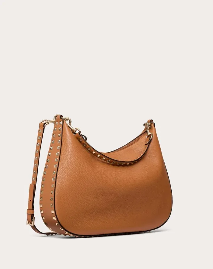 Valentino Shoulder Bags Woman Valentino Garavani Rockstud Hobo Bag In Grainy Calfskin For Woman In Almond Almond Valentino Shoulder Bags Woman Valentino Garavani Rockstud Hobo Bag In Grainy Calfskin For Woman In Almond Almond