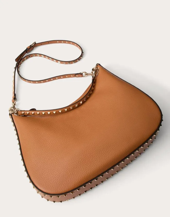 Valentino Shoulder Bags Woman Valentino Garavani Rockstud Hobo Bag In Grainy Calfskin For Woman In Almond Almond Valentino Shoulder Bags Woman Valentino Garavani Rockstud Hobo Bag In Grainy Calfskin For Woman In Almond Almond