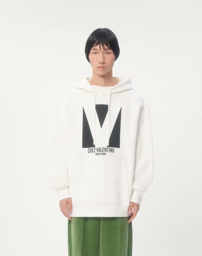 Valentino Tshirts And Sweatshirts Man Cotton Hooded Sweatshirt With Chez Valentino Print For Man In Ivory Ivory Valentino Tshirts And Sweatshirts Man Cotton Hooded Sweatshirt With Chez Valentino Print For Man In Ivory Ivory